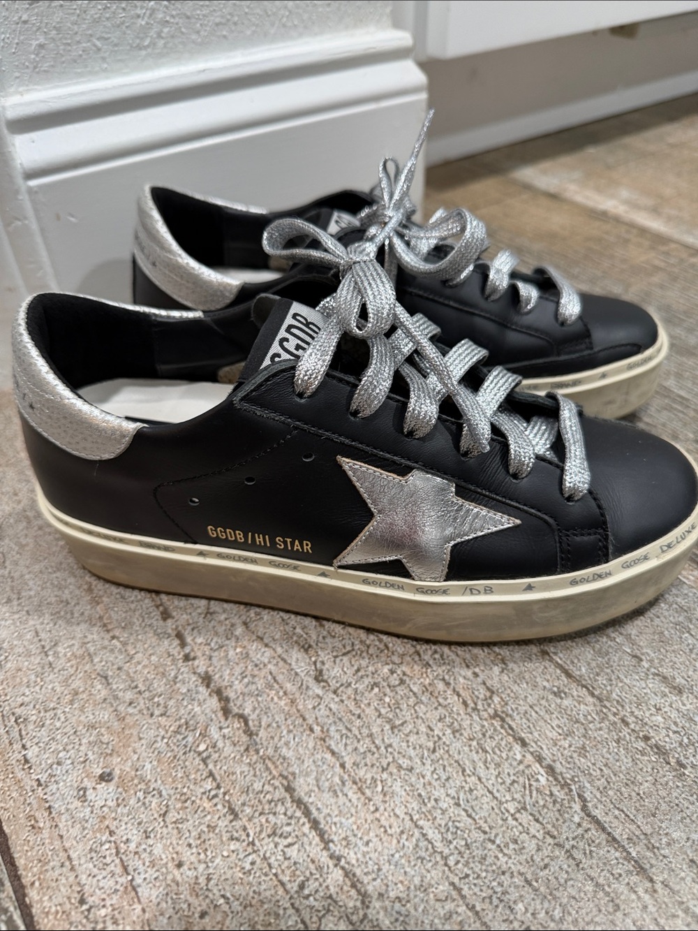 Golden Goose Women’s Black Leather Superstar Sneakers with Silver Accents